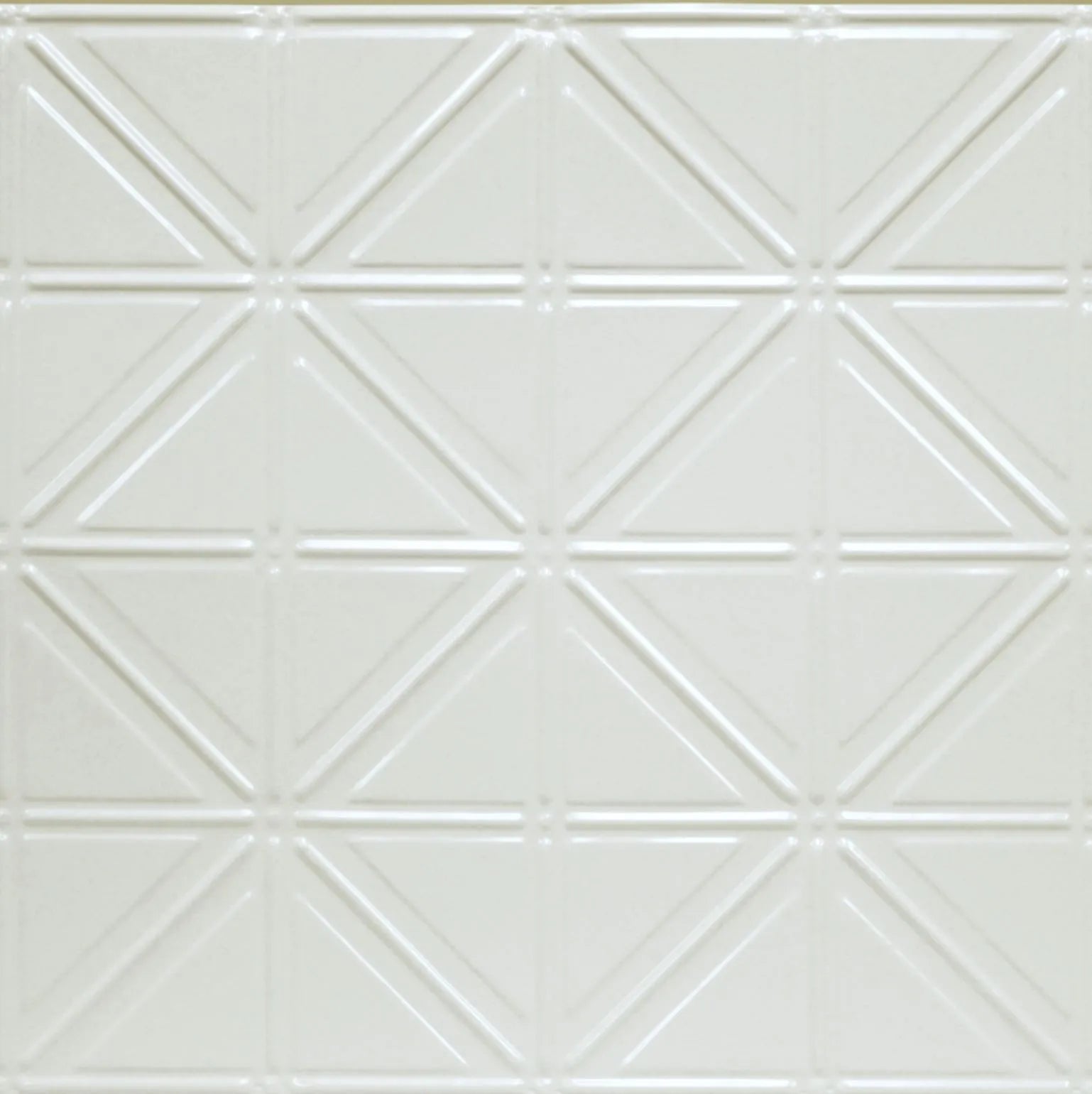 White ceramic tile with a geometric triangle pattern on a white background.
