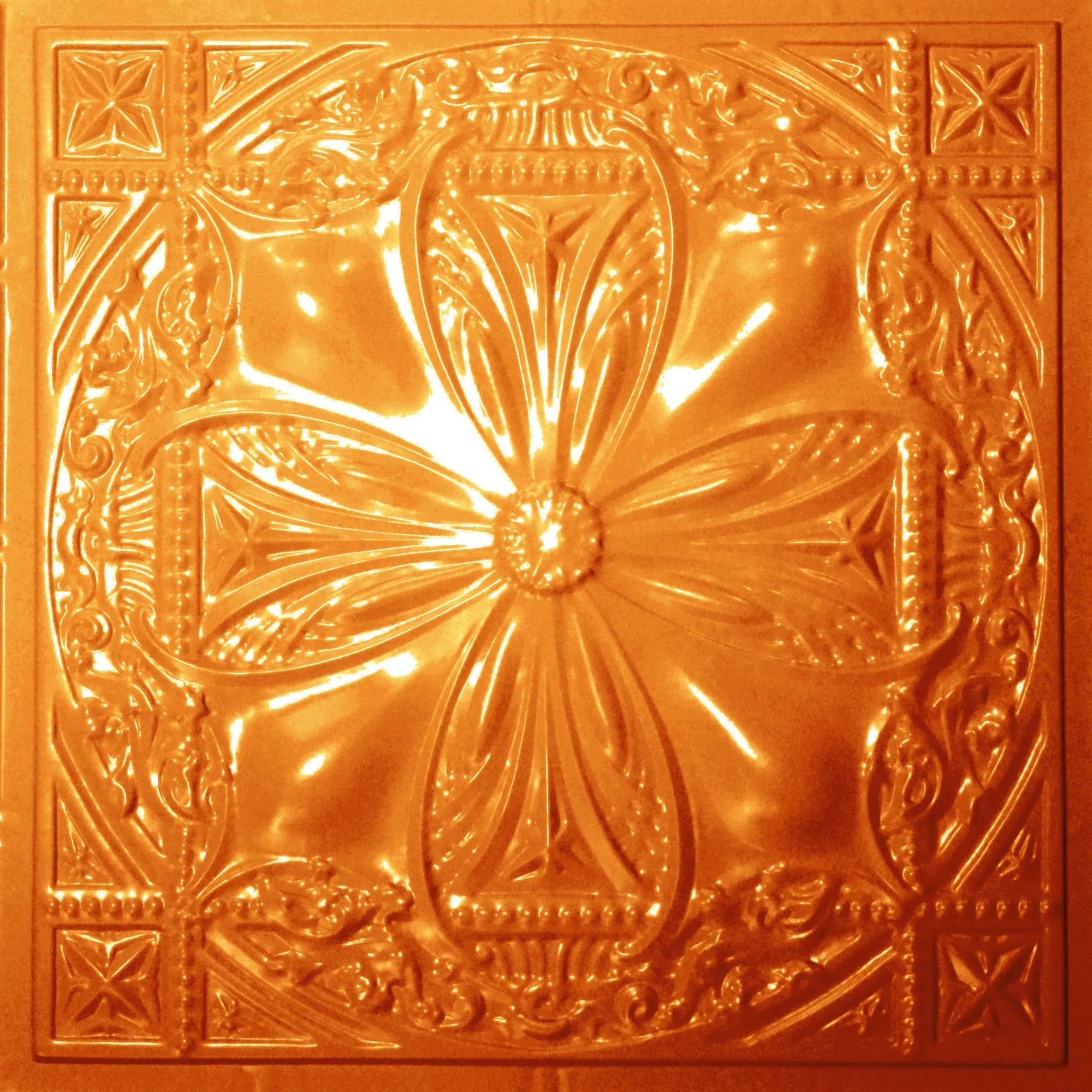Decorative gold ceiling tile with intricate patterns.