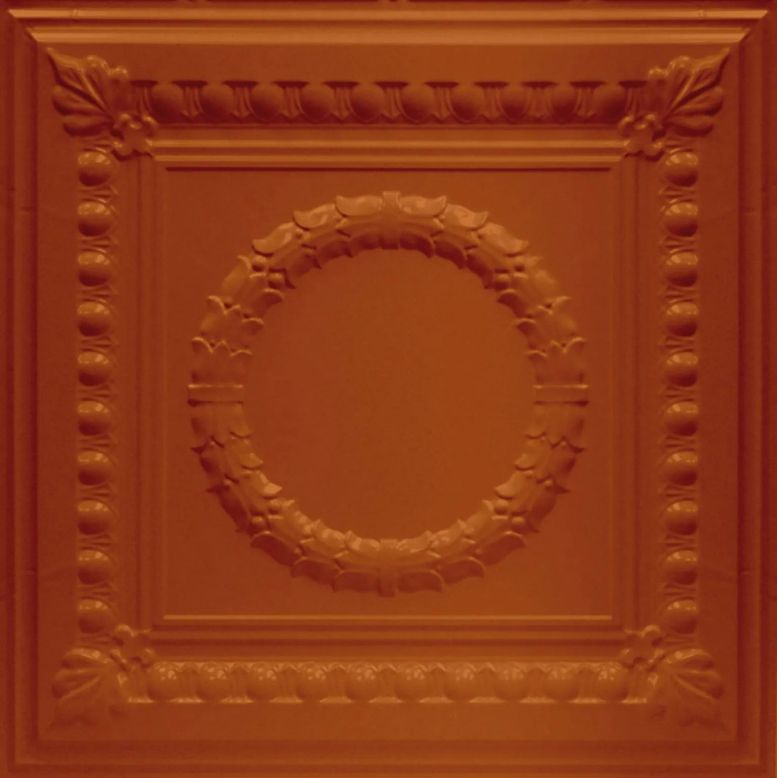 Decorative ceiling tile with circular wreath design on a red-brown background.