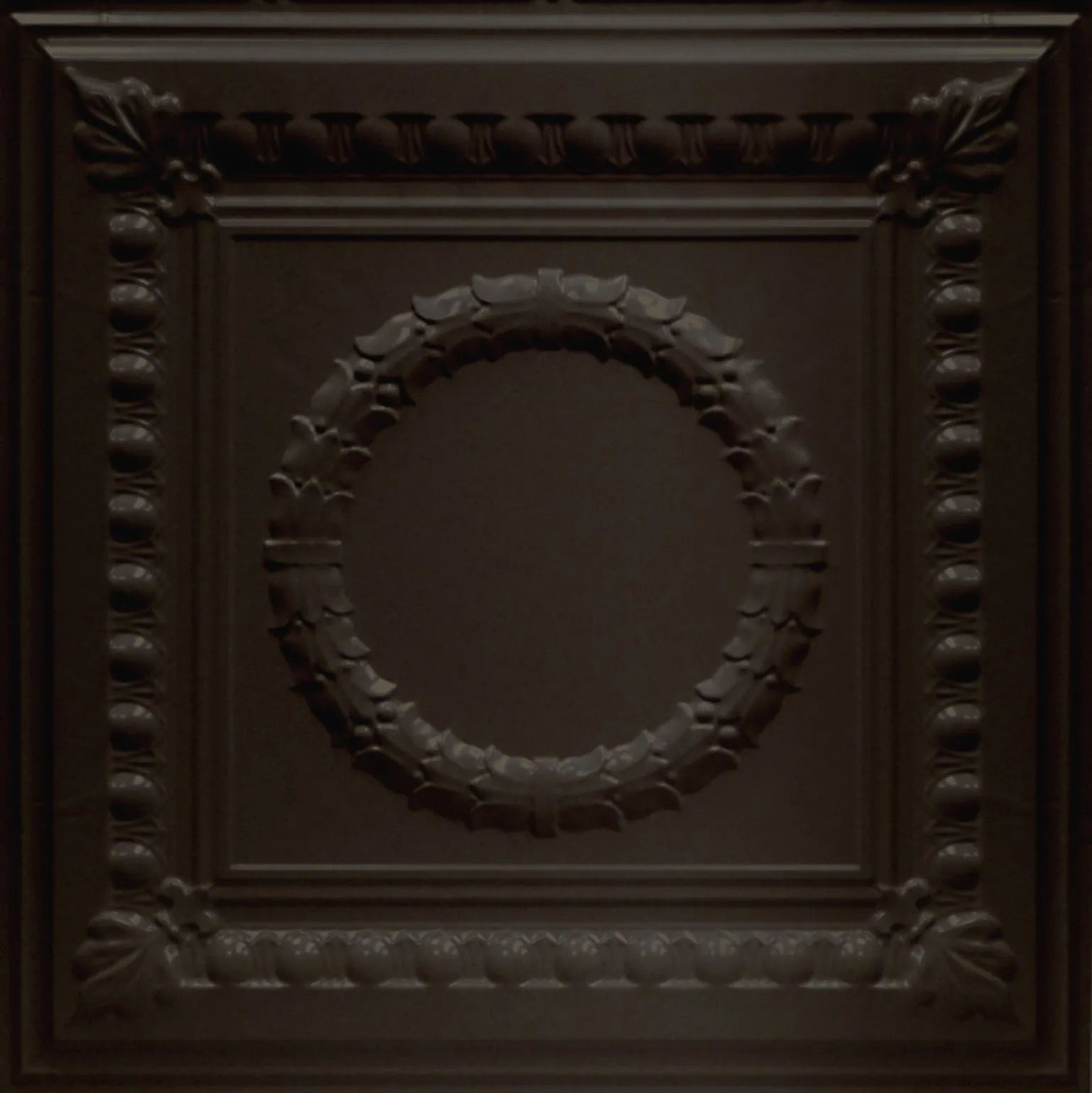 Decorative ceiling tile with intricate patterns.