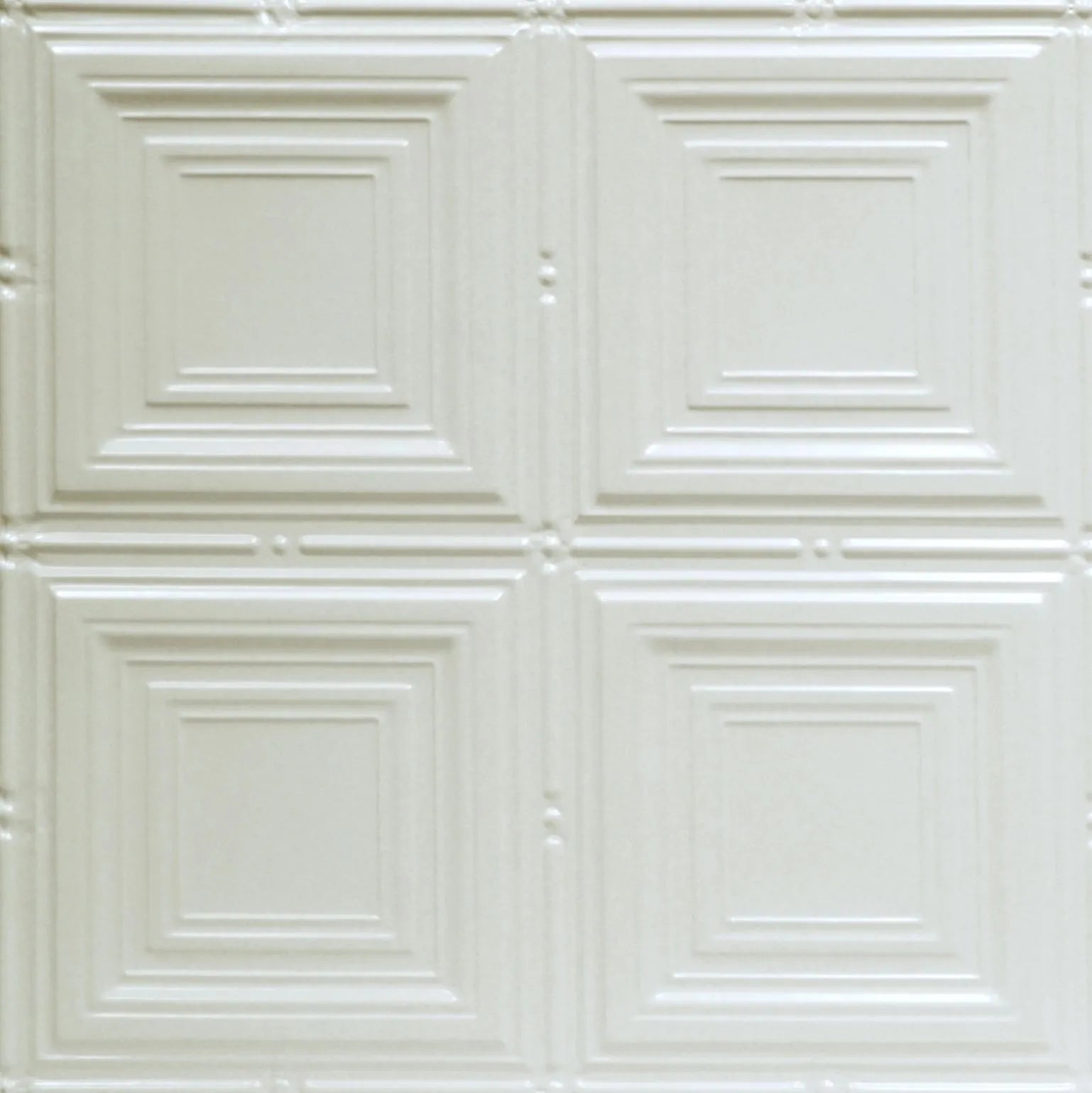 White decorative ceiling tile with geometric pattern.
