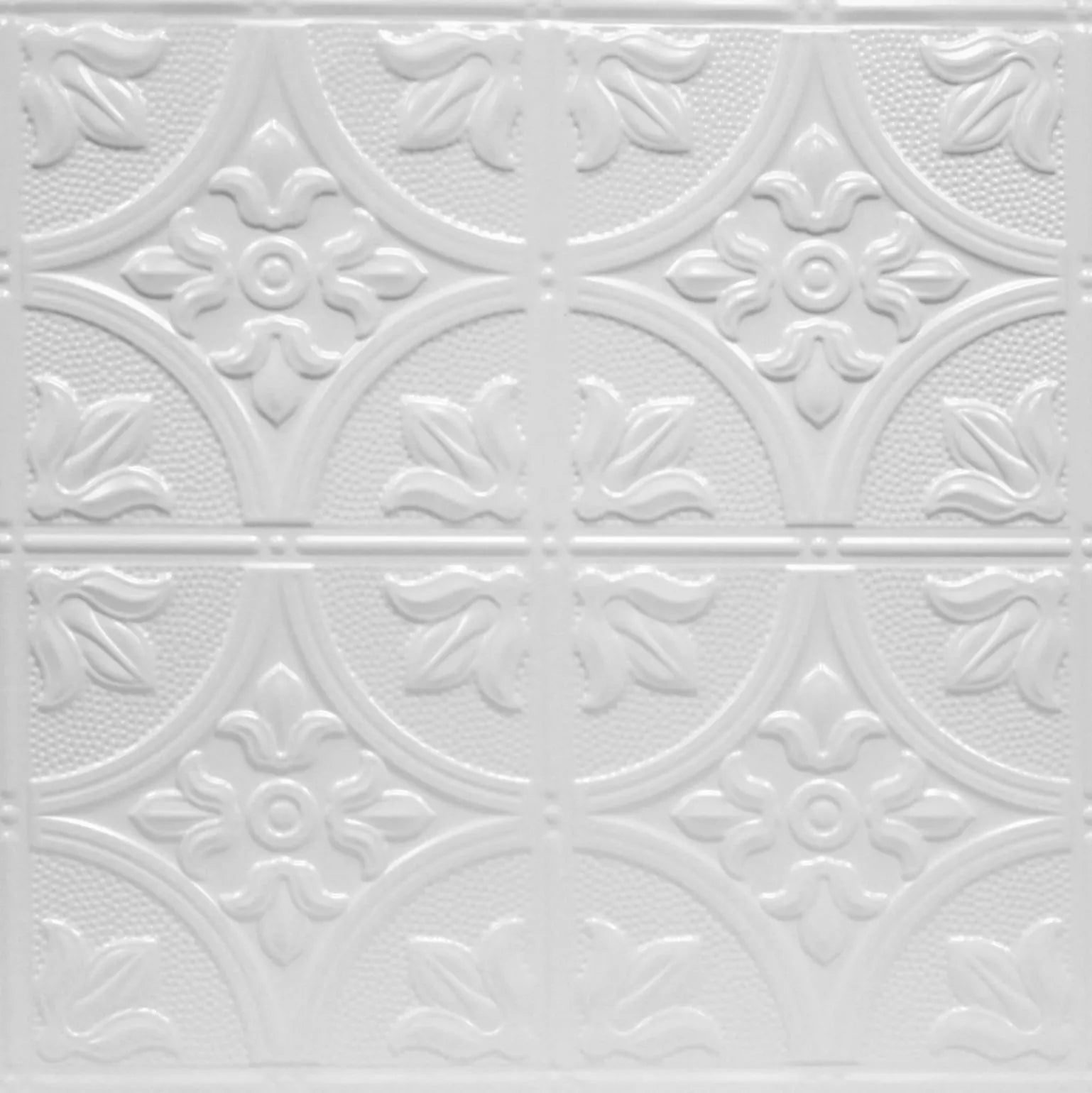 Decorative white ceiling tile with floral patterns.