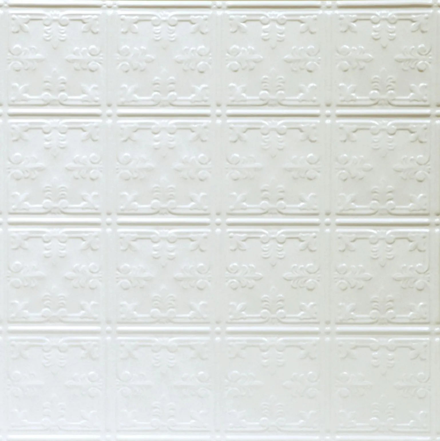 Textured white wall panel with decorative patterns.