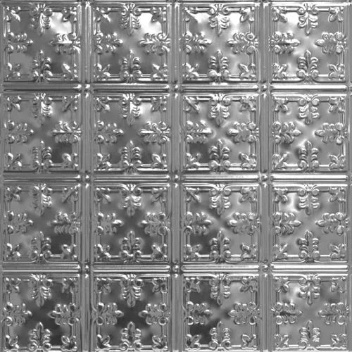 Decorative metallic ceiling tile with intricate patterns.