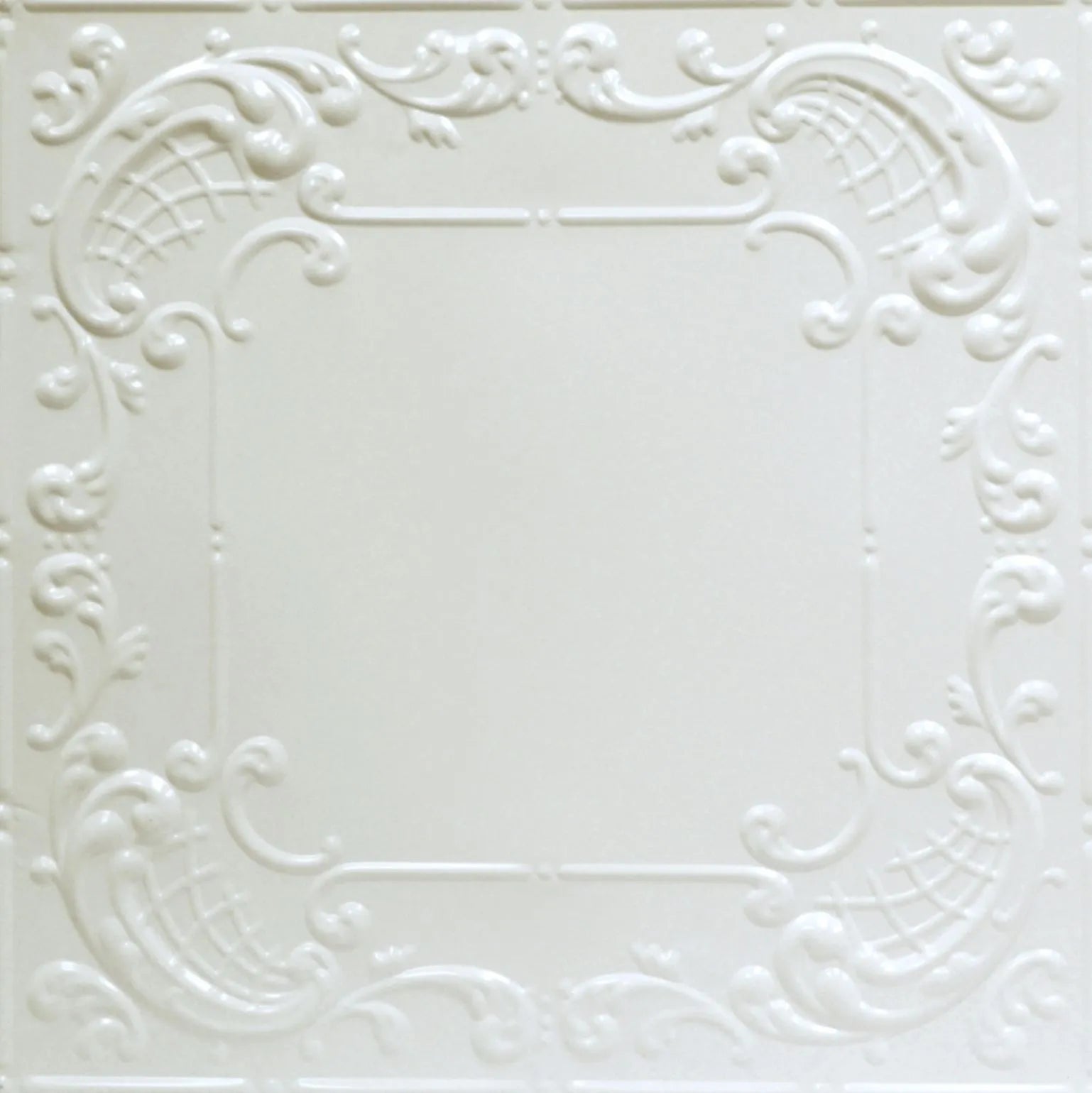 Decorative white tile with intricate patterns on a white background.