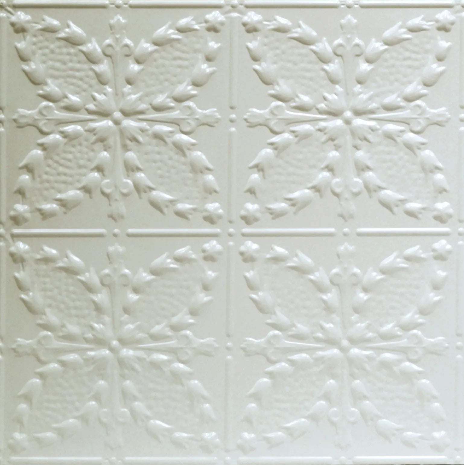 White textured ceiling tile with floral pattern