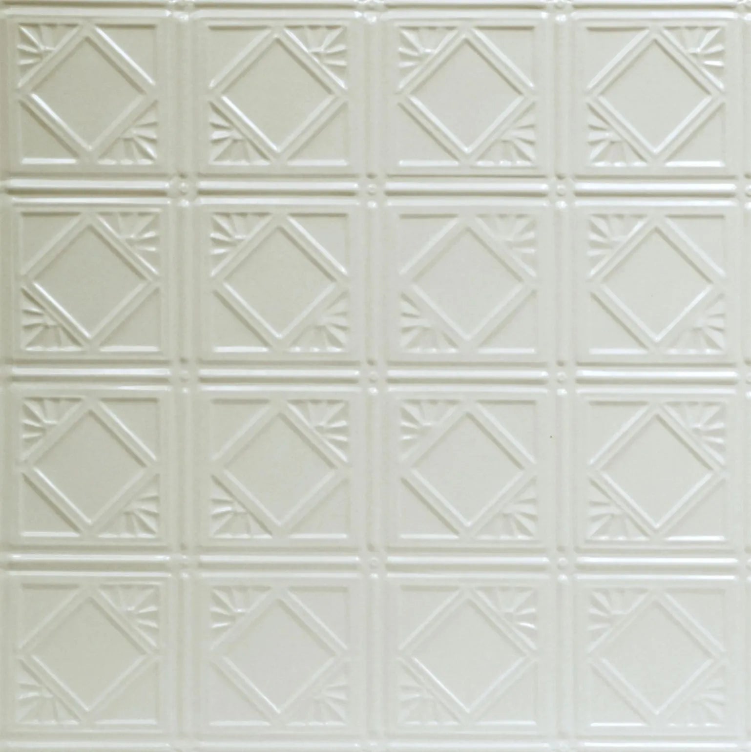 White decorative ceiling tile with geometric pattern.