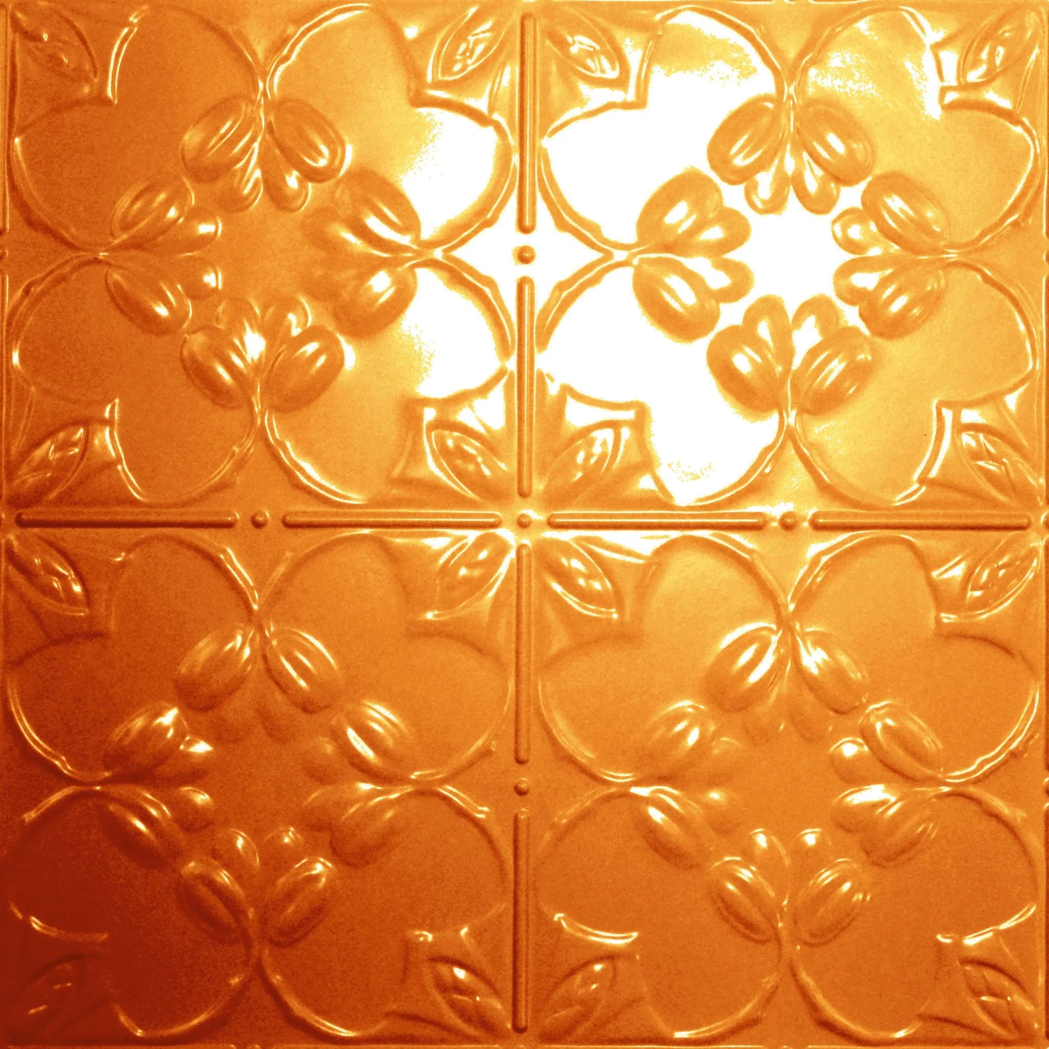 Decorative orange tile with floral pattern.