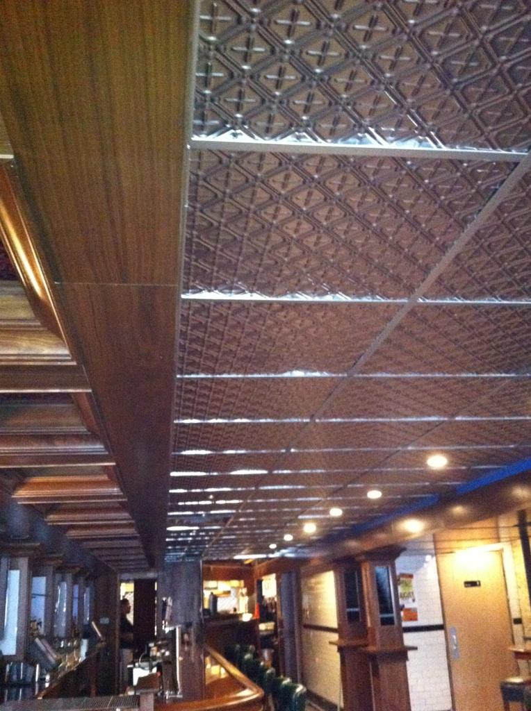 Ceiling with decorative pattern in a possibly indoor setting
