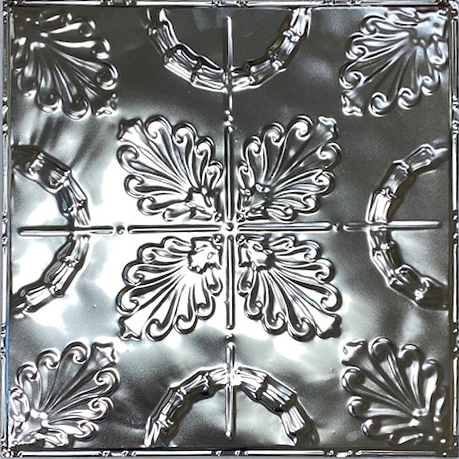 Decorative metal ceiling tile with intricate patterns.