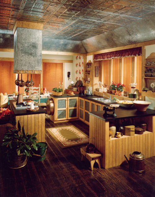 Vintage-style kitchen with wooden cabinets and decorative ceiling.
