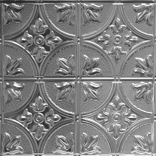Decorative metallic ceiling tile with floral patterns.