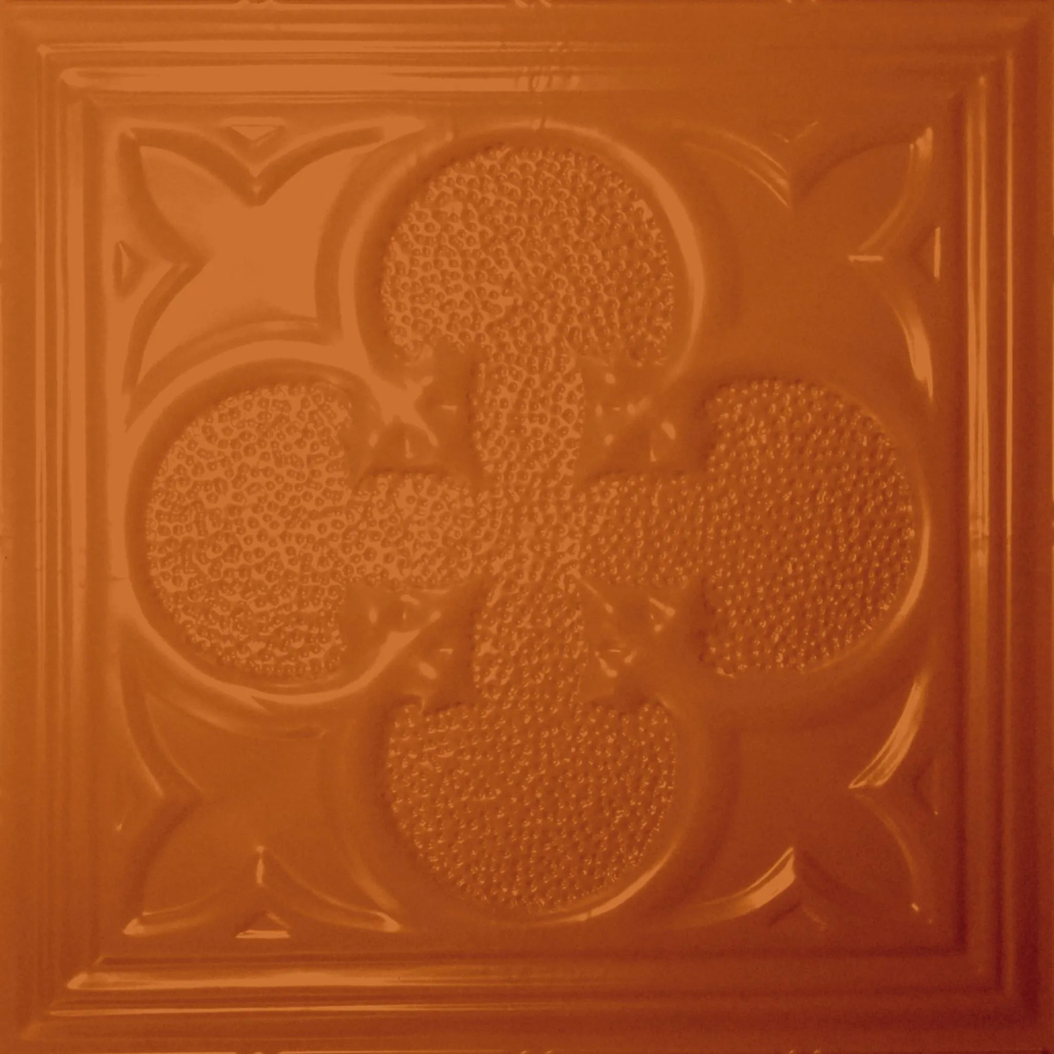 Decorative brown tile with embossed pattern.