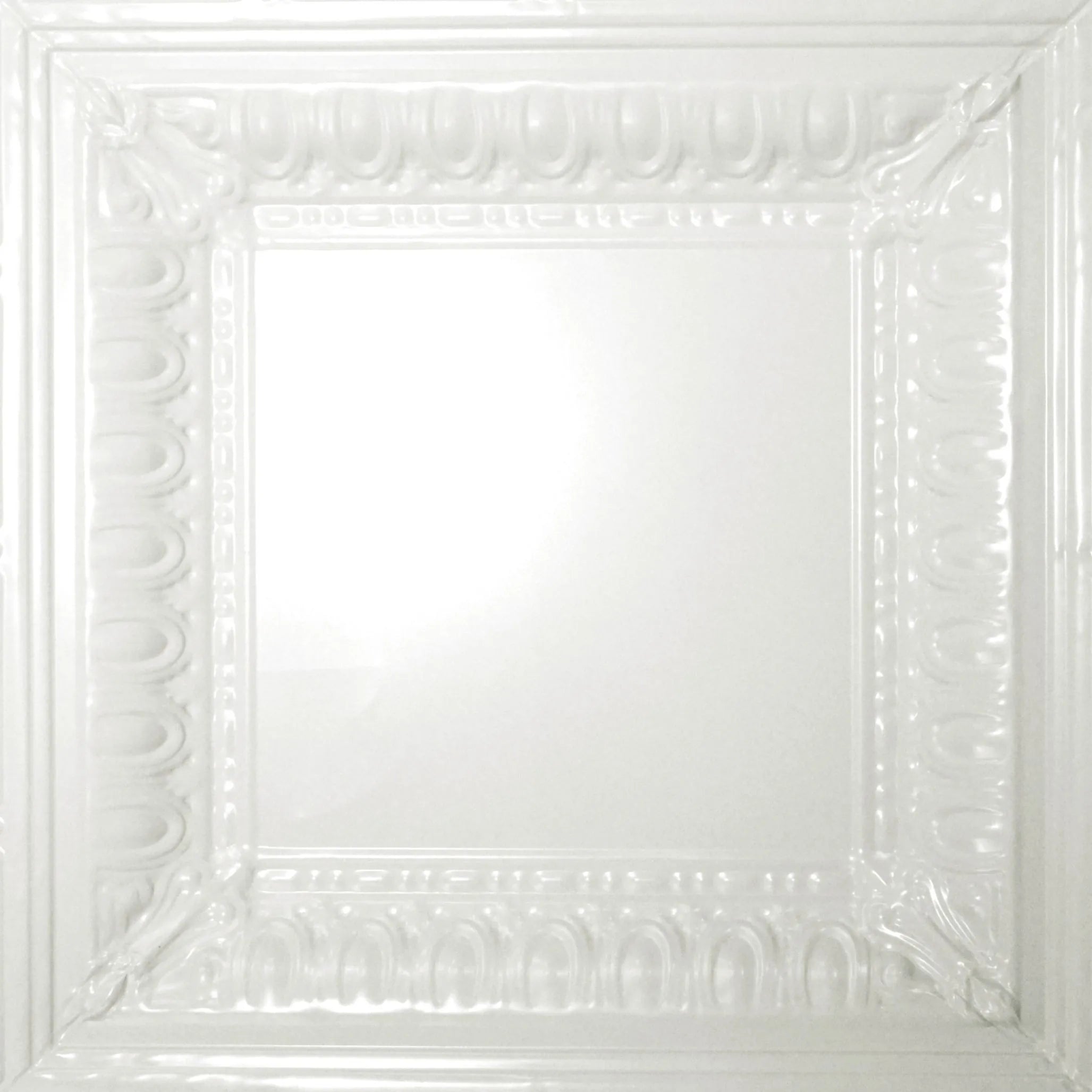 Decorative white ceiling tile with intricate patterns