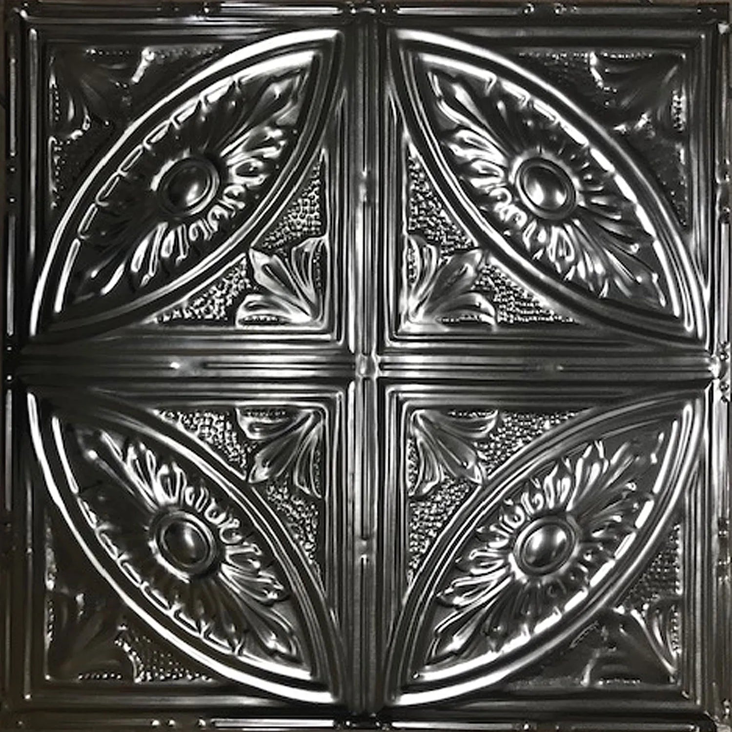 Decorative metallic ceiling tile with intricate patterns.