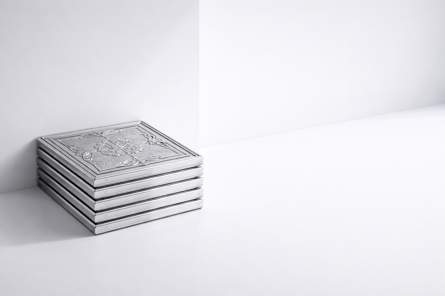 silver book stack on a white background.