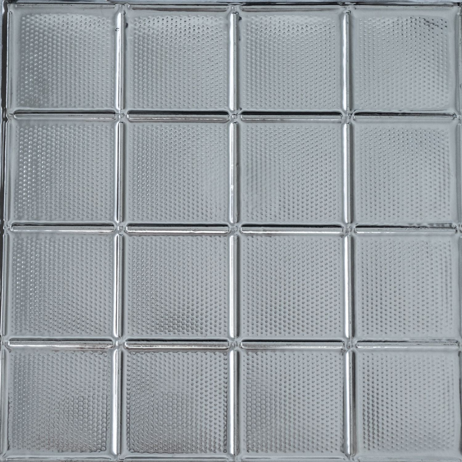 Grid of glass blocks with a textured pattern.
