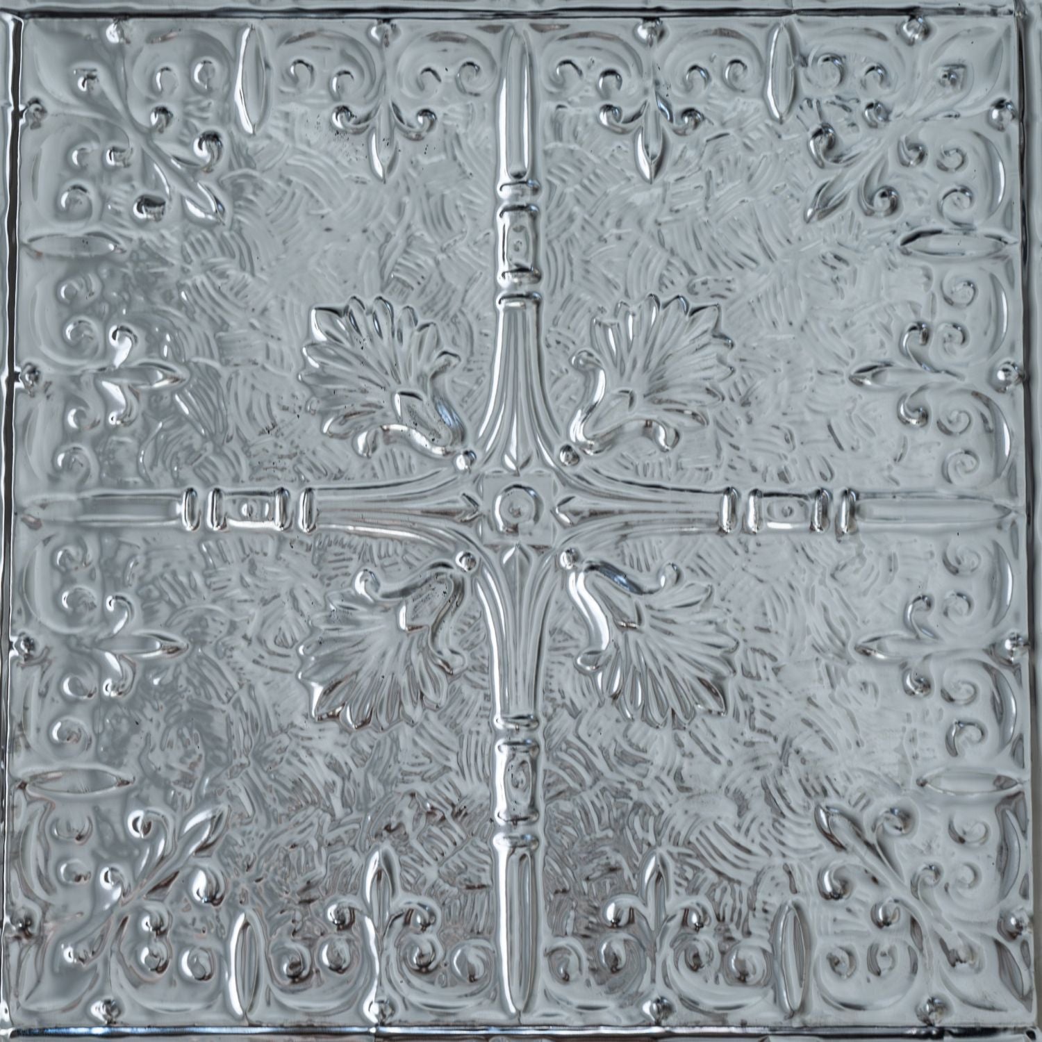 Decorative metallic panel with cross design