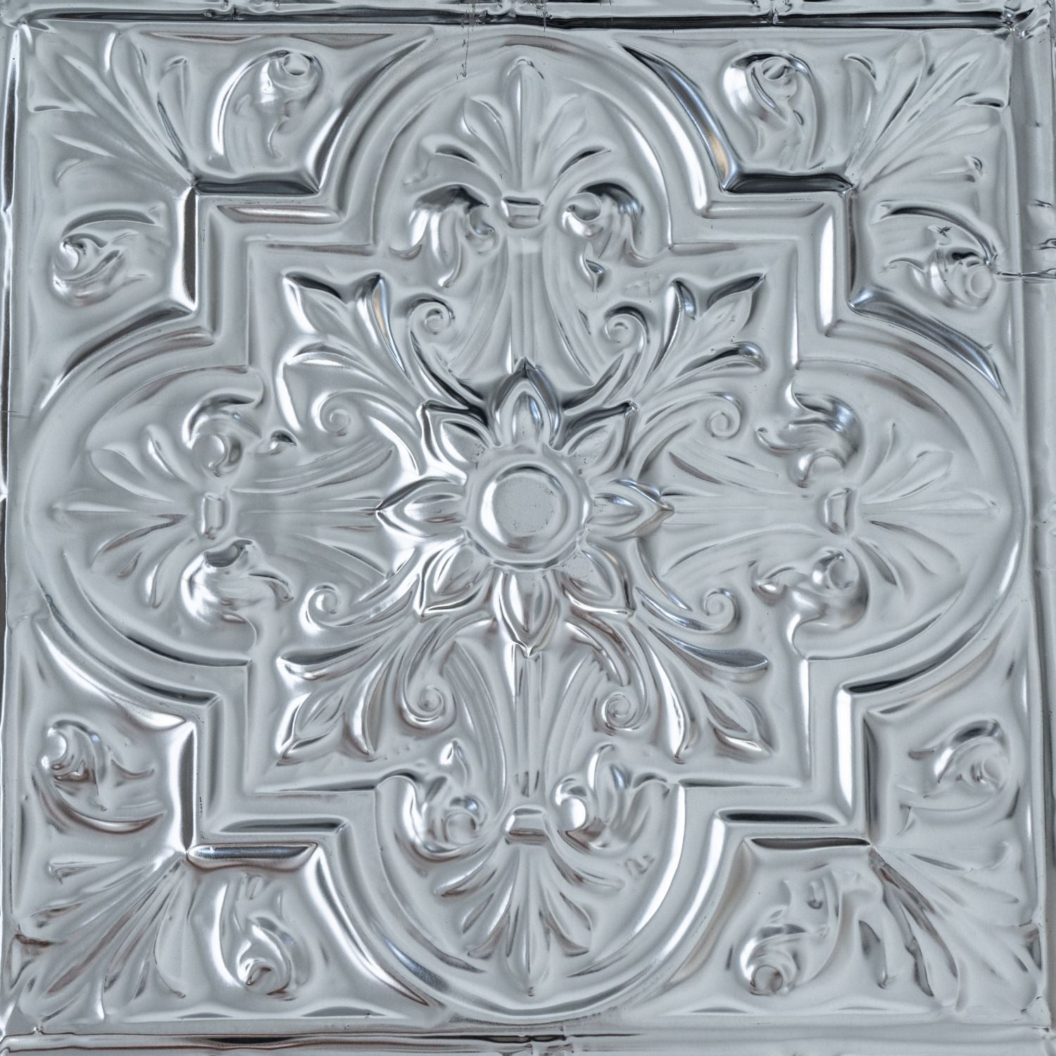 Decorative metallic tile with intricate patterns
