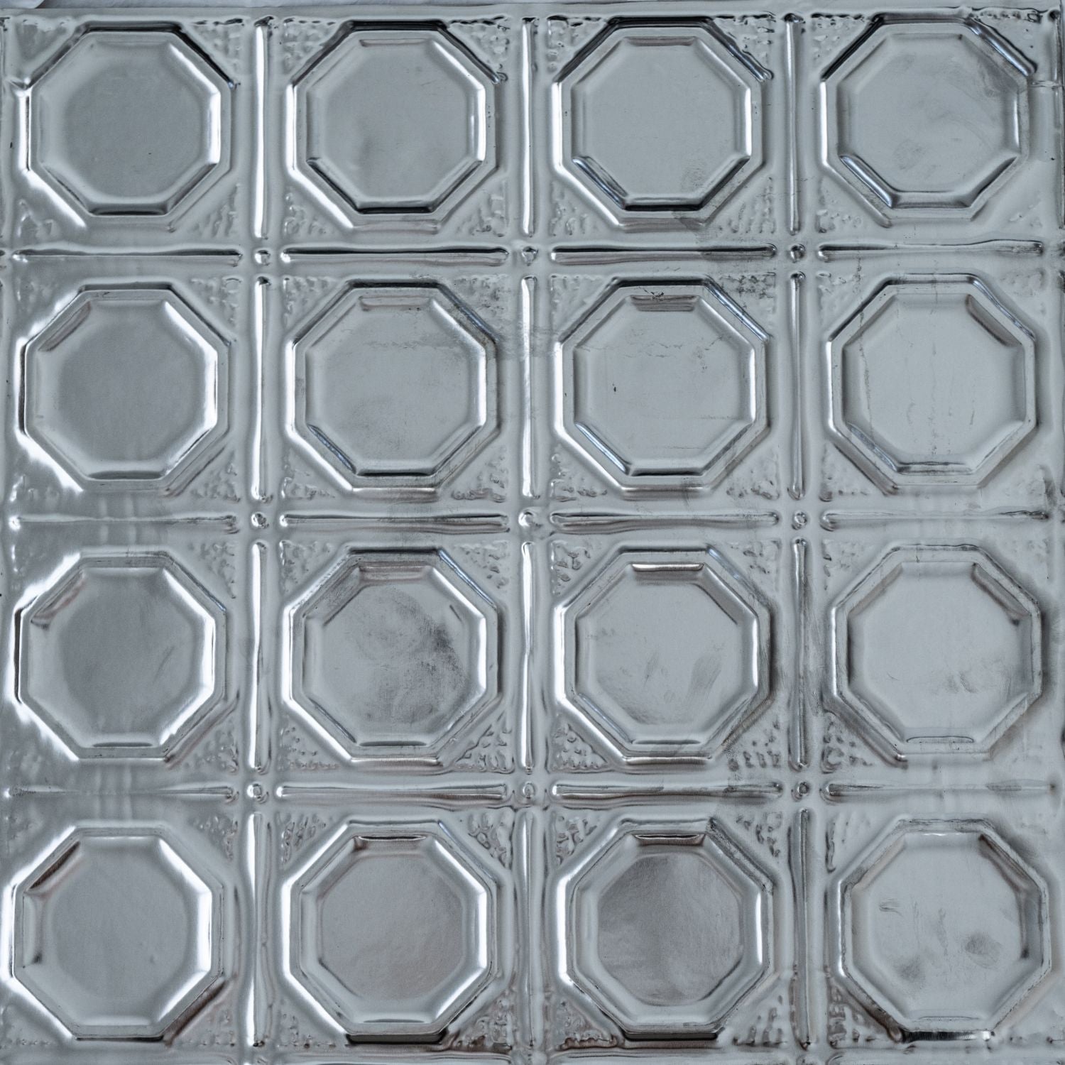 Metallic decorative ceiling tile with octagonal pattern