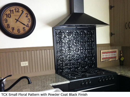 Black decorative stove with floral pattern in a kitchen setting